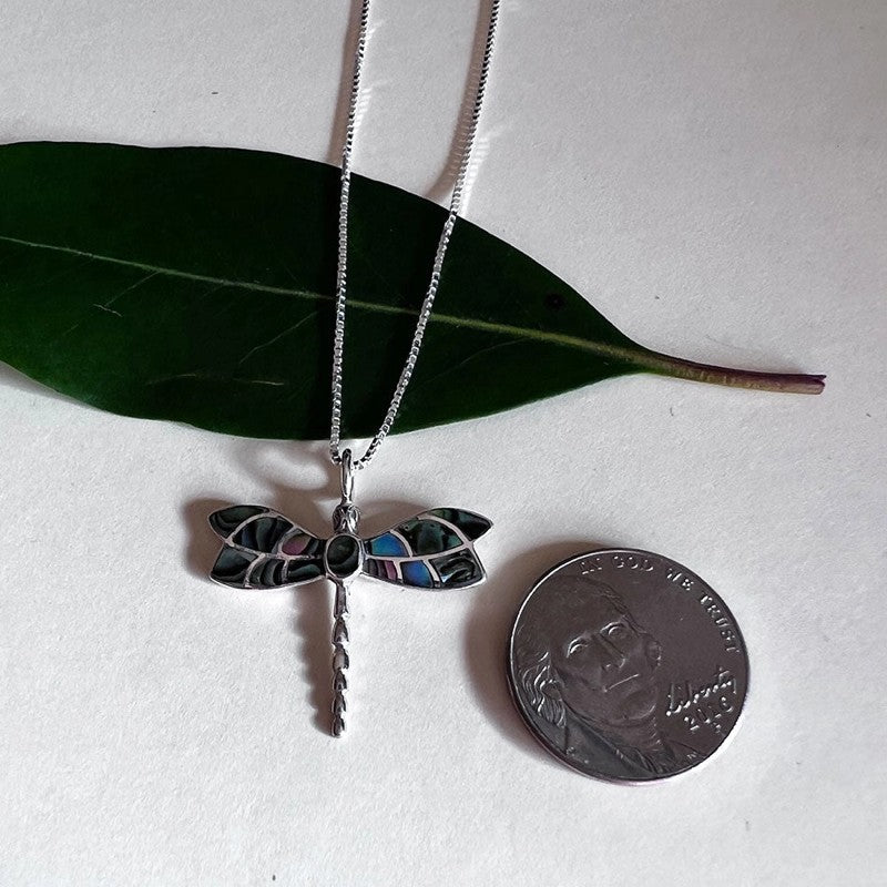 Abalone dragonfly pendant necklace from Women's Peace Collection featuring a shimmering, colorful dragonfly charm on a delicate chain.