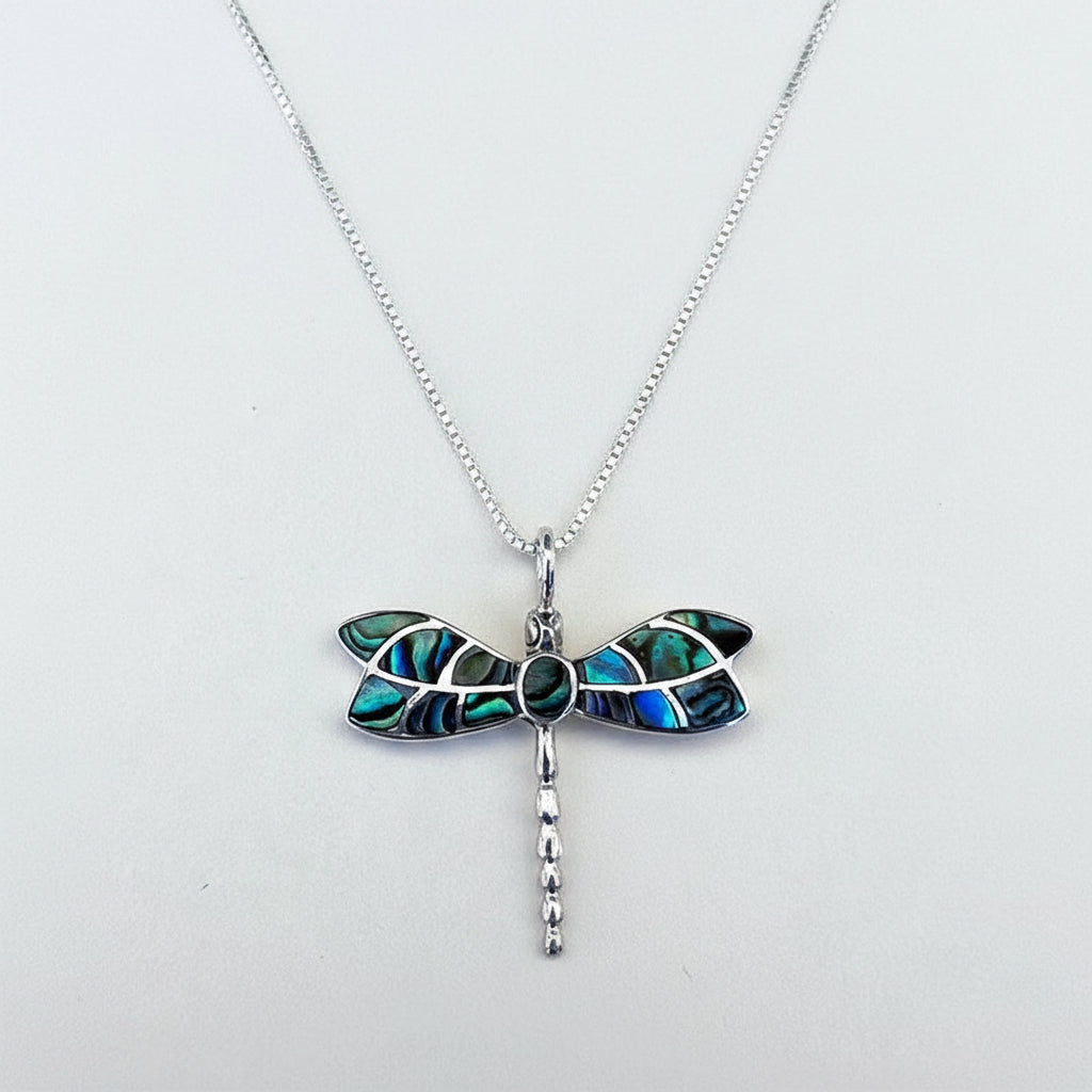 Women's Peace Collection abalone dragonfly necklace featuring a detailed, colorful pendant on a delicate chain.