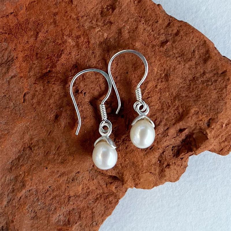 Women's Peace Collection Acorn Pearl Earrings featuring elegant pearl drops.