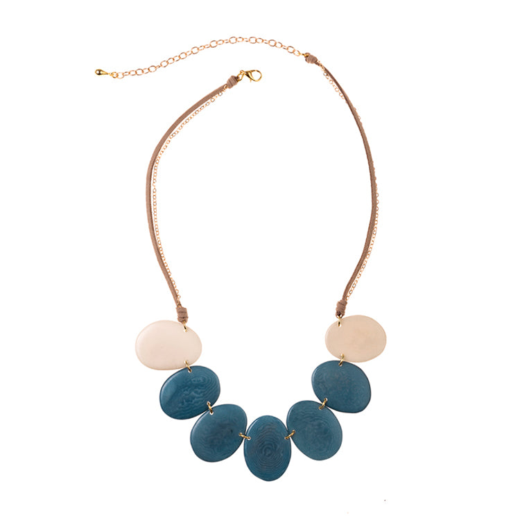 Blue Moon April Necklace by Faire Collection featuring a delicate chain with a blue moon pendant, elegant jewelry for special occasions.