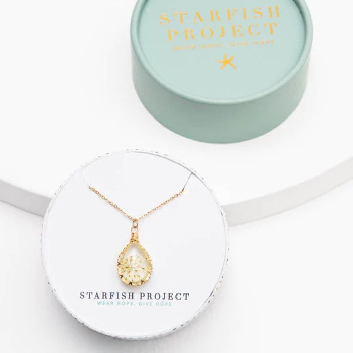 Starfish Project Blossom Necklace featuring a delicate floral pendant on a fine chain, perfect for elegant everyday wear.