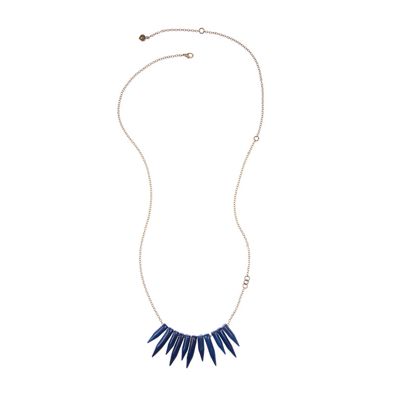 Faire Collection Brooklyn Necklace in Strength Blue featuring a sleek silver chain and a vibrant blue pendant.