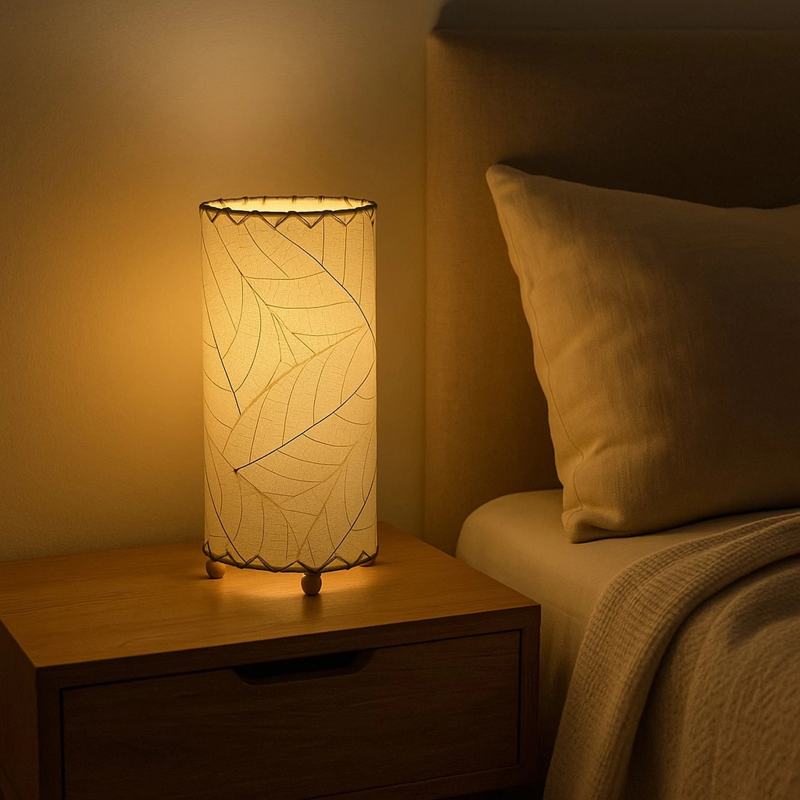 Eangee Cocoa Leaf Cylinder Table Lamp in natural finish, 12-inch height with leaf-shaped shade, ideal for ambient lighting.