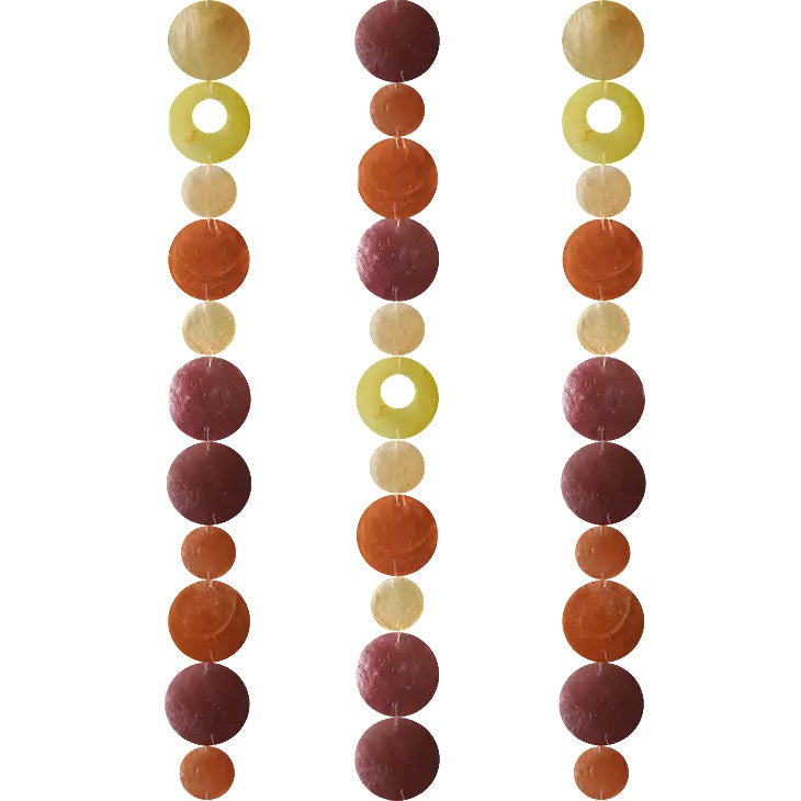 Zen-Zen Capiz Shell Strand in Flame color, showcasing delicate, translucent shell beads on a natural string for decorative use.