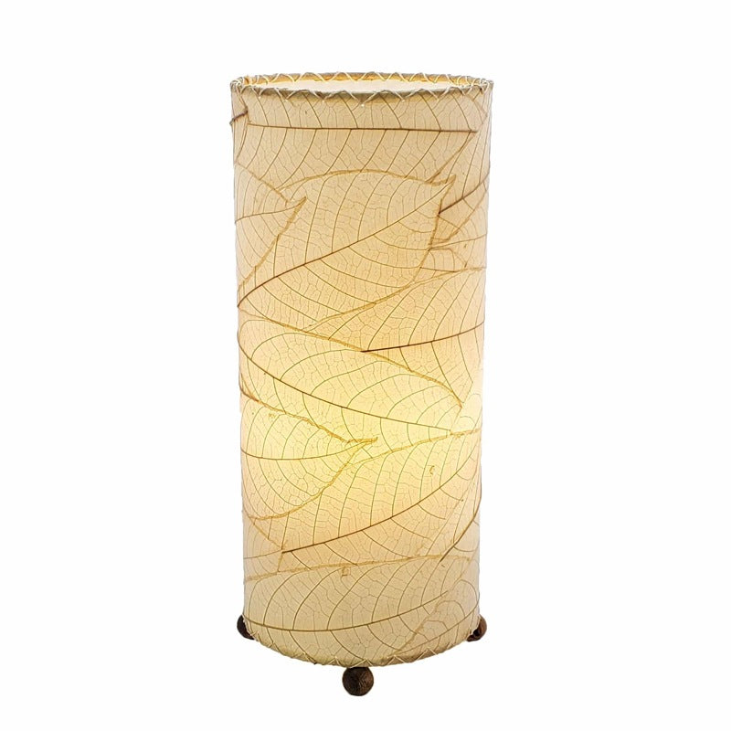 Eangee Cocoa Leaf Cylinder Leaf Lamp in natural finish, showcasing a handcrafted design with leaf-shaped cutouts for warm ambient light.
