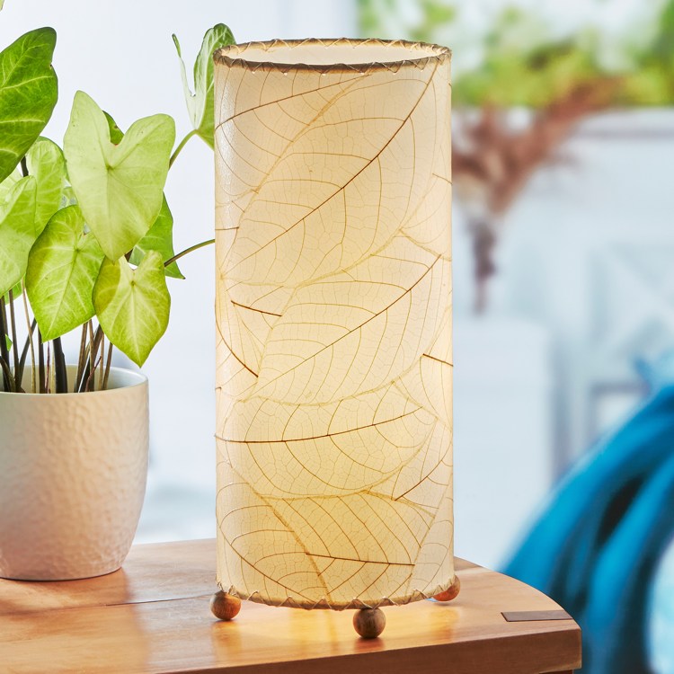 Eangee Cocoa Leaf Cylinder Lamp with natural leaf design, showcasing intricate leaf patterns and warm lighting for stylish home decor.