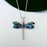Women's Peace Collection abalone dragonfly necklace featuring a detailed, colorful pendant on a delicate chain.