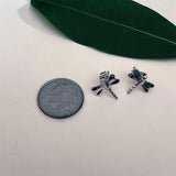 Silver Abalone Dragonfly Stud Earrings from Women's Peace Collection featuring detailed dragonfly design with iridescent abalone shell.