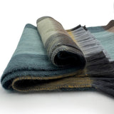 Golden Coast Alpaca Plaid Scarf by Shupaca featuring soft, warm alpaca wool with a stylish plaid pattern in natural tones.
