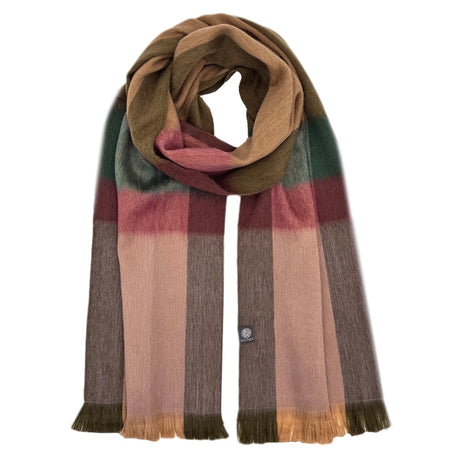 Shupaca alpaca plaid scarf featuring a cozy, woven pattern in warm, earthy tones ideal for stylish winter wear.