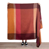 Soft amber alpaca throw blanket from Shupaca, showcasing plush, cozy alpaca fiber in a warm, inviting color.