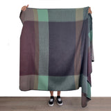 Soft alpaca throw blanket in twilight color from Shupaca, showcasing its cozy, luxurious texture and elegant drape.