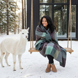 Soft alpaca throw blanket in twilight color from Shupaca, showcasing its cozy, textured fabric and elegant drape.