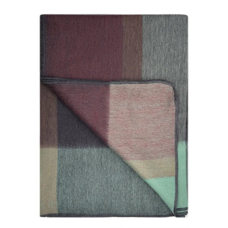 Shupaca Twilight alpaca throw blanket featuring soft, cozy fibers in a calming twilight color for luxurious warmth and comfort.