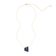 Andes Pendant from Faire Collection featuring denim blue beads and silver accents, hanging from a delicate chain.
