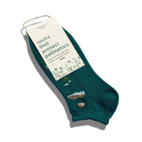 Teal ankle socks with hedgehog and pollinator designs by Conscious Step, featuring playful wildlife patterns and comfortable fit.