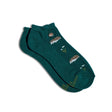 Teal ankle socks by Conscious Step featuring hedgehog and pollinator motifs, crafted to promote pollinator protection and awareness.