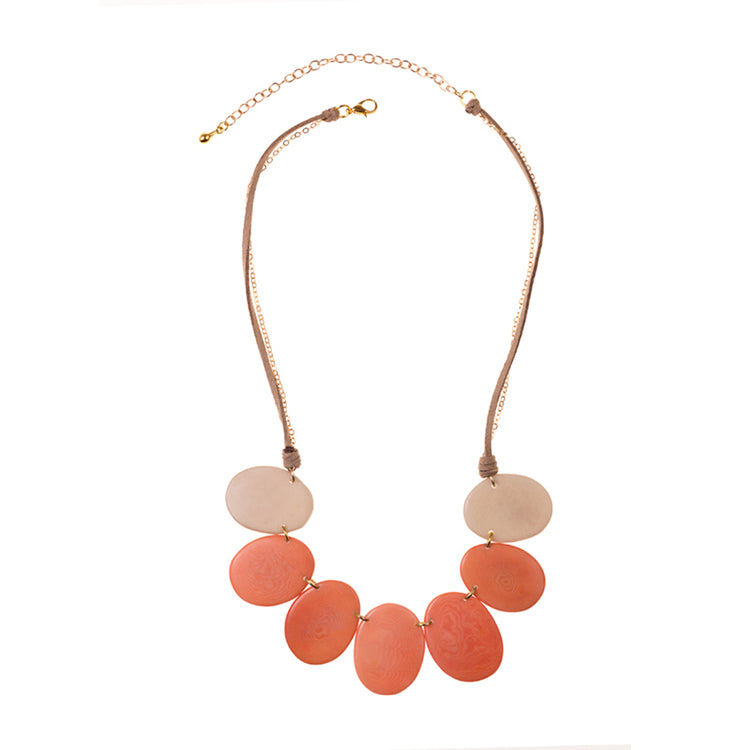 Golden April Necklace by Faire Collection featuring a melon-colored pendant on a delicate chain.