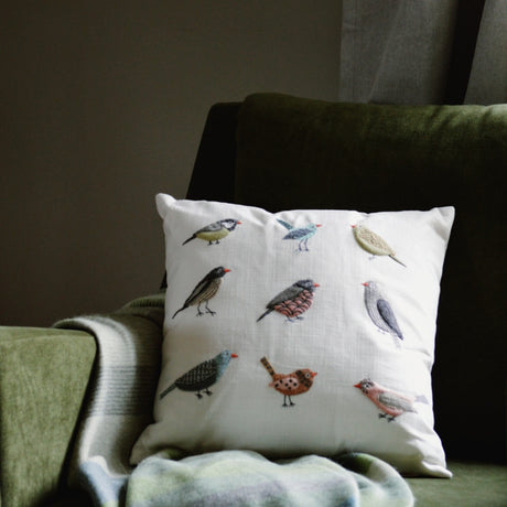 Aviary Cream Pillow Styled with Throw