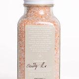Bright Endeavors eucalyptus bath salts in 16 oz jar with natural mineral crystals and fresh eucalyptus leaves for relaxing bath experience.