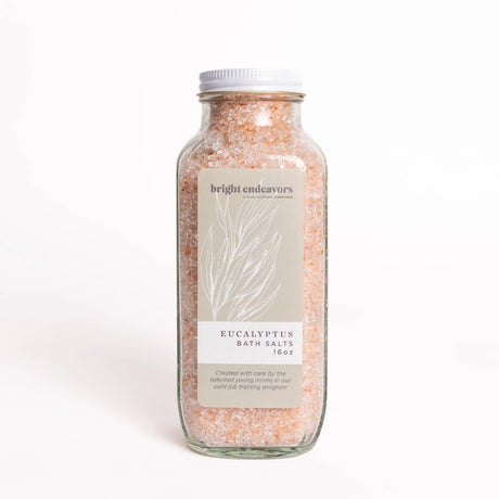 Bright Endeavors eucalyptus bath salts in a 16 oz jar, showcasing natural, aromatic bath salt crystals for relaxing soaks.