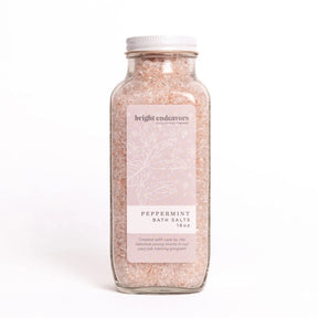 Bright Endeavors peppermint bath salts in a 16 oz container, showcasing aromatic mineral crystals for soothing, relaxing bath experiences.