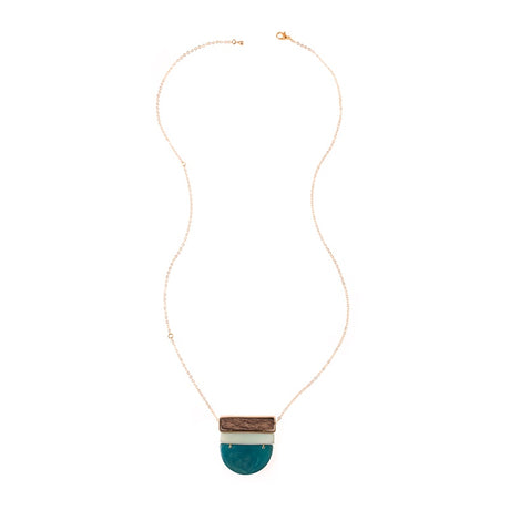 Silver Belgrano Necklace by Faire Collection featuring a sleek midnight-colored pendant on a delicate  chain.