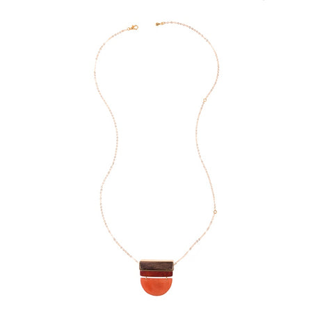 Belgrano Necklace in orange rust by Faire Collection featuring a stylish, handcrafted jewelry design with vibrant color.
