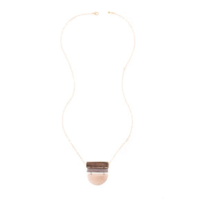 Elegant Belgrano Necklace in sand color featuring layered gold-tone chains, from Faire Collection.