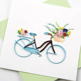 Quilling Card featuring a detailed bicycle with a flower basket, showcasing intricate paper art design by Quilling Card.