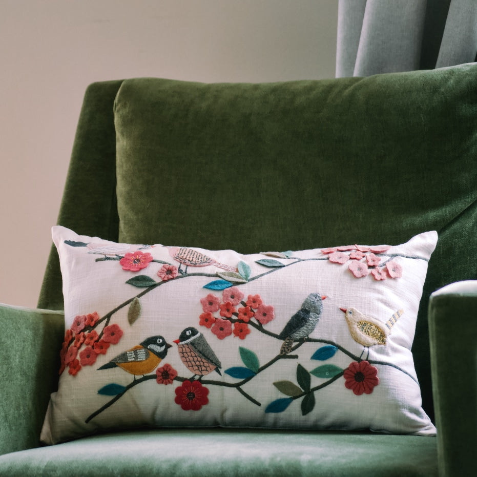 Natural Habitat Bird Flock multi-embroidered decorative pillow, 12x20 inches, featuring colorful bird designs on soft fabric.