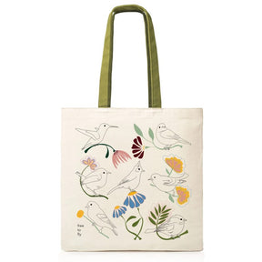 Tote bag with bird and floral design on a white background