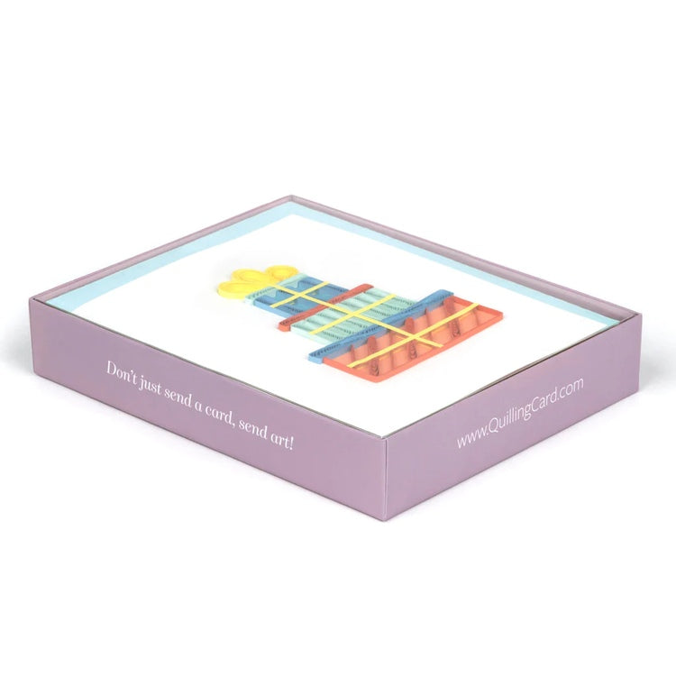 Set of beautifully crafted birthday quilling cards in a branded boxed collection, featuring intricate paper art designs.