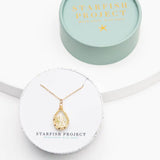 Starfish Project Blossom Necklace featuring a delicate floral pendant on a fine chain, perfect for elegant everyday wear.