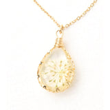 Starfish Project Blossom Necklace featuring delicate floral pendant on a silver chain, perfect for elegant everyday wear.