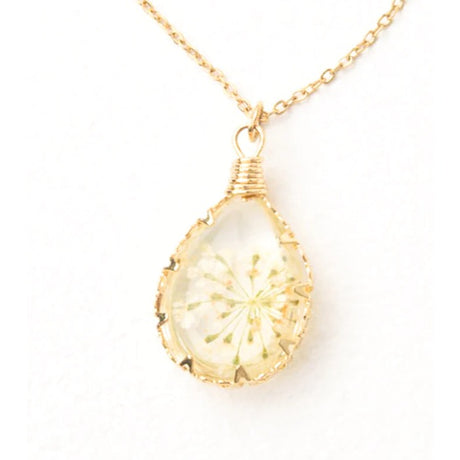 Starfish Project Blossom Necklace featuring delicate floral pendant on a silver chain, perfect for elegant everyday wear.