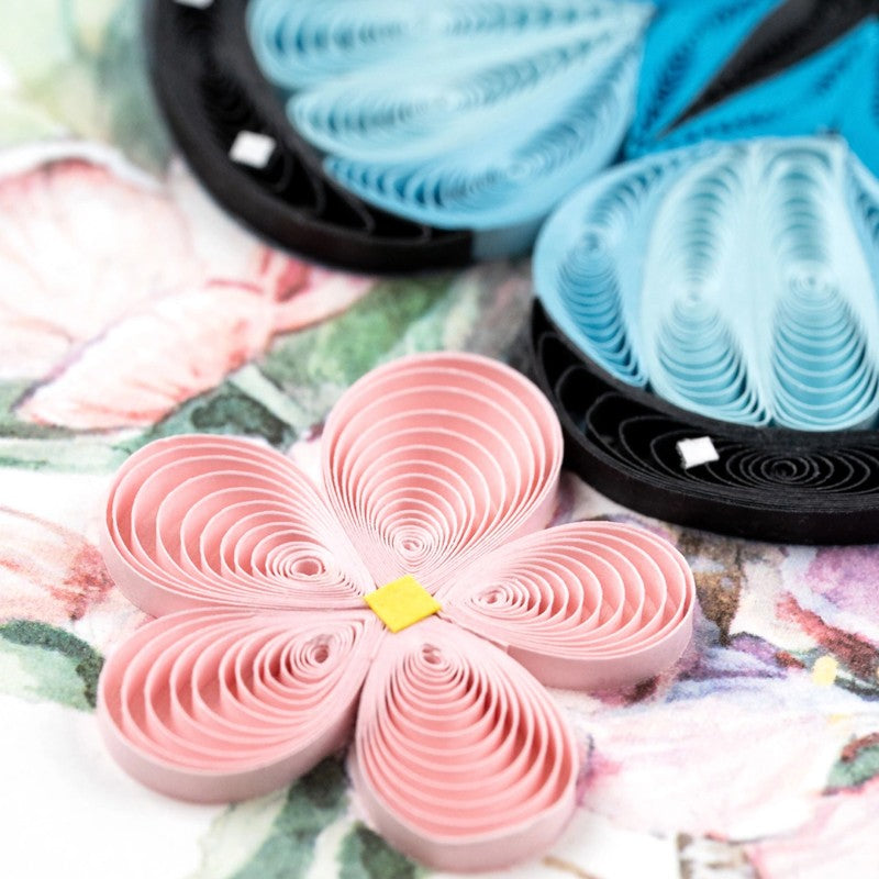 Blue butterfly and pink flower quilling card featuring intricate paper art design from Quilling Card.
