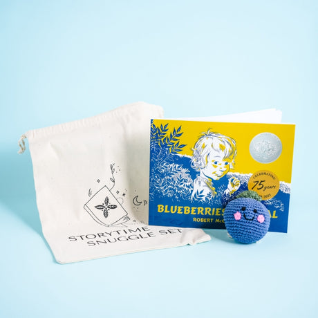 Fair Trade Winds Blueberries for Sal storytime snuggle set featuring the classic children's book and blueberry rattle in cotton bag.
