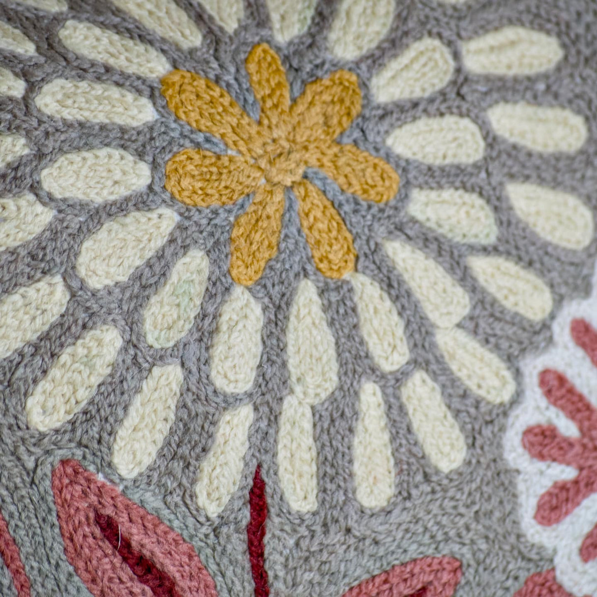 Botanical 18-inch Chainstitch Pillow in Sand with floral embroidery and soft fabric for decorative comfort.