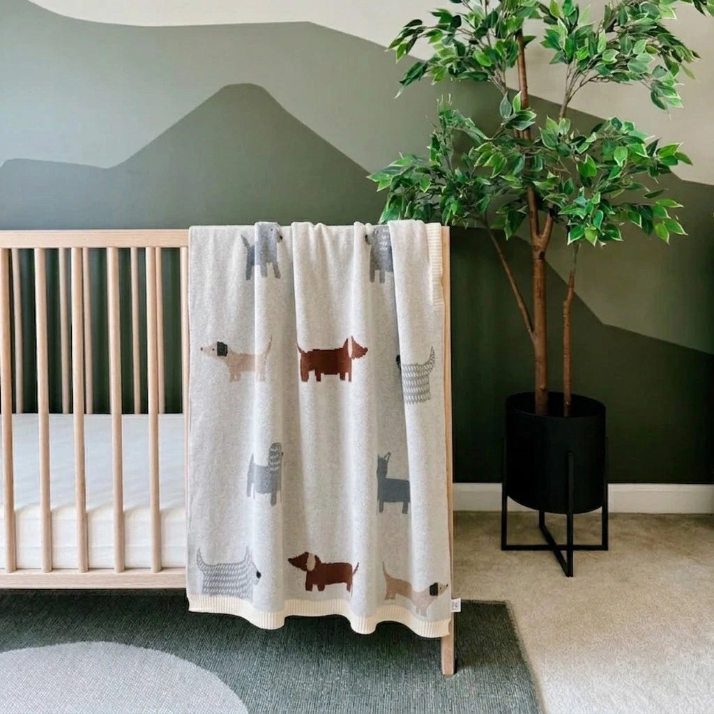 Viverano Buddy Dog baby blanket featuring soft fabric and a cute dog design, perfect for cozy nursery decor.