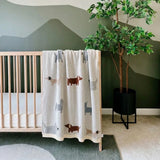 Viverano Buddy Dog baby blanket featuring soft fabric and a cute dog design, perfect for cozy nursery decor.