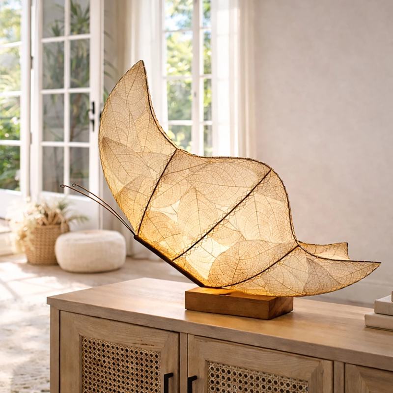 Large natural butterfly table lamp by Eangee featuring intricate butterfly designs and warm lighting for decorative use.