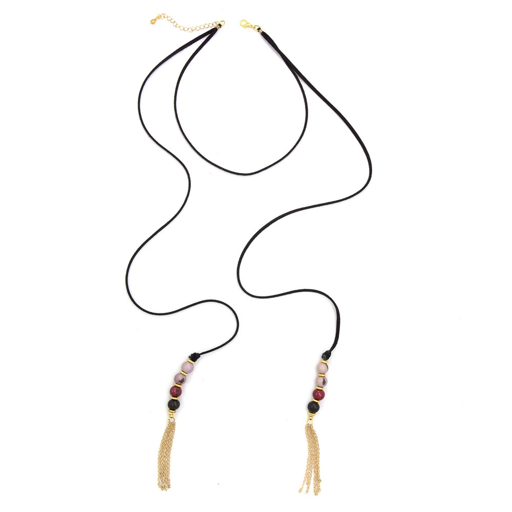 Faire Collection Cannes Lariat necklace in rich burgundy, featuring a stylish draped design and elegant jewelry craftsmanship.