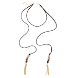 Faire Collection Cannes Lariat necklace in rich burgundy, featuring a stylish draped design and elegant jewelry craftsmanship.