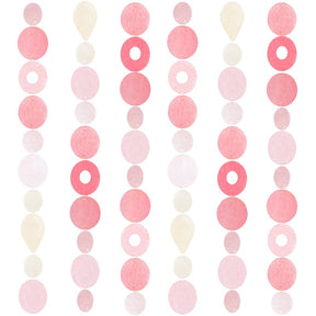 Pink Capiz shell strand by Zen-Zen featuring shimmering, translucent shells arranged in a delicate, decorative necklace or garland.