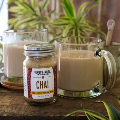 Burlap & Barrel chai spice blend in a jar, featuring cinnamon, cardamom, and other aromatic spices for tea and baking.