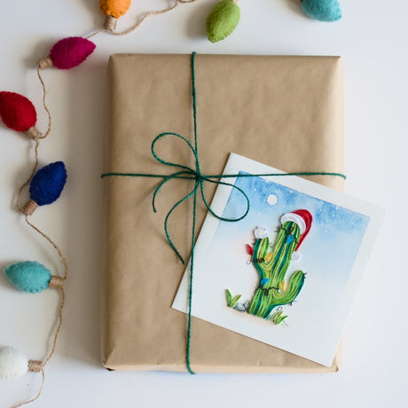 Christmas Cactus quilling card featuring intricate paper quilling art of a festive cactus plant with colorful floral details.