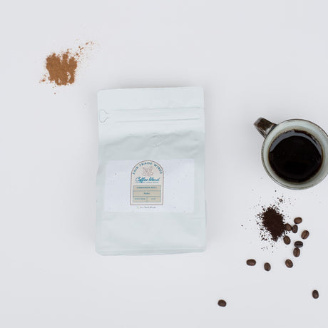 Louisiana Roasting Company cinnamon roll flavored whole bean coffee in a 10 oz bag, aromatic and perfect for brewing rich, flavorful coffee.