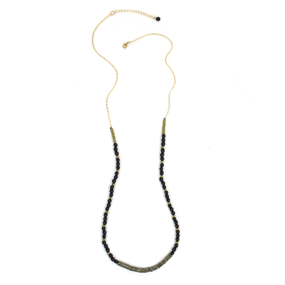 Faire Collection City Necklace featuring a sleek onyx pendant on a delicate chain, perfect for elegant everyday wear.