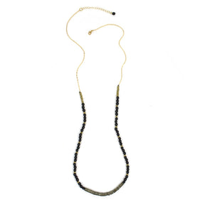 Faire Collection City Necklace featuring a sleek onyx pendant on a delicate chain, perfect for elegant everyday wear.